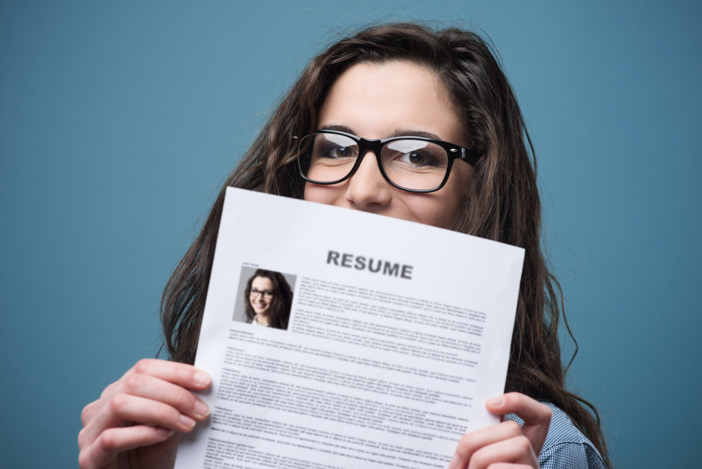 An applicant and her resume ready for work
